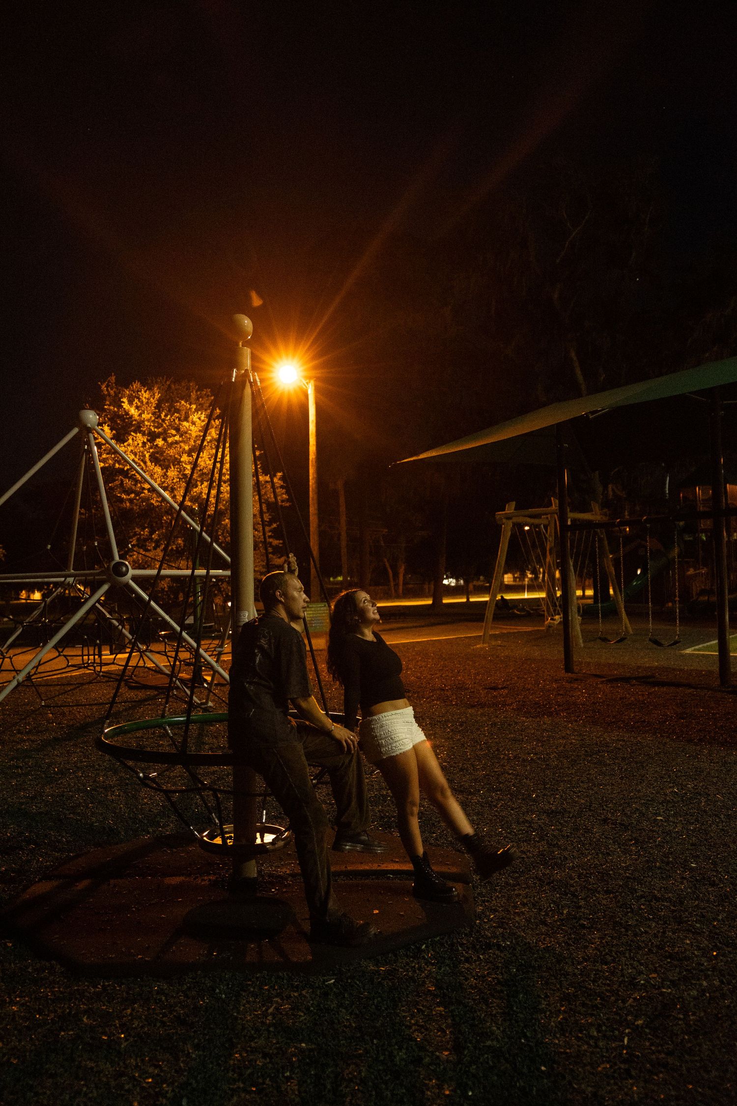 Candid outdoor couples nighttime photoshoot