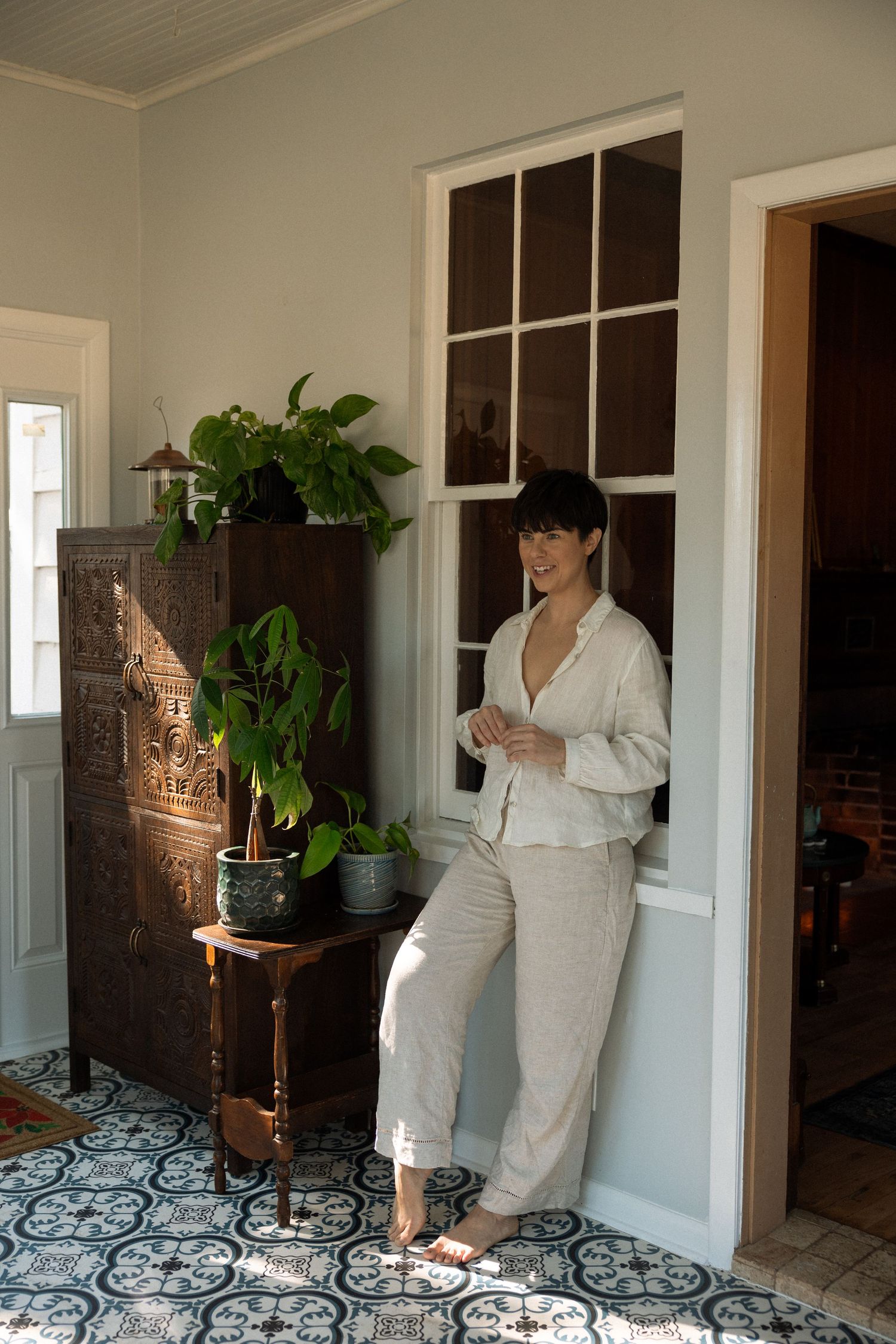 Portrait session featuring a woman relaxing with a cup of tea