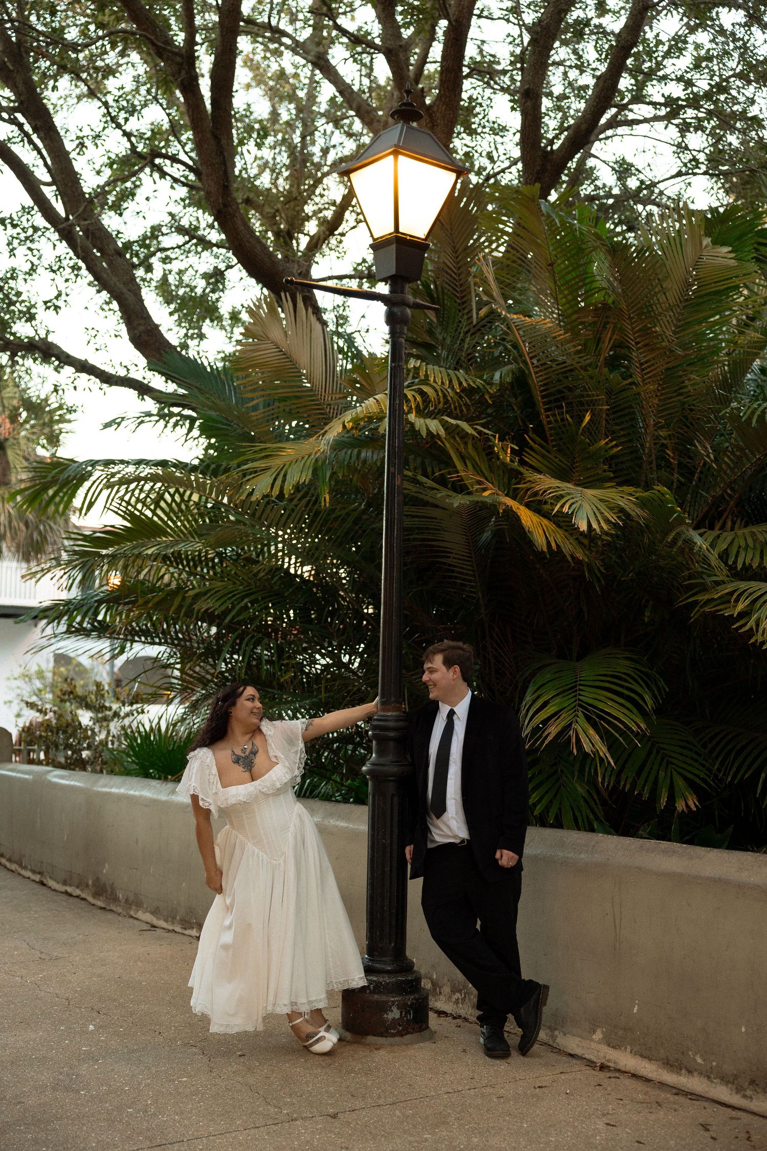 Couple walking through historic downtown St. Augustine after their elopement