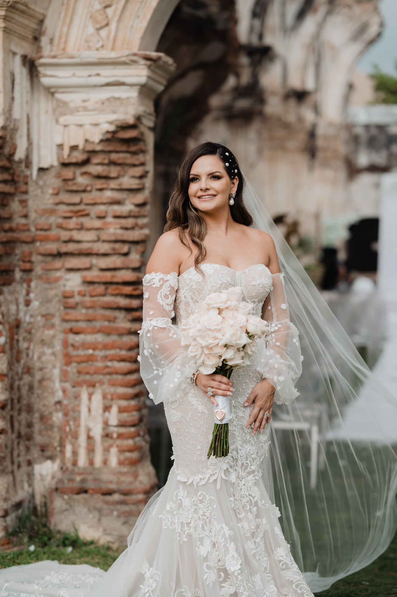 Wedding photography series featuring bridal portraits with flowing veil and blush bouquet against brick walls.