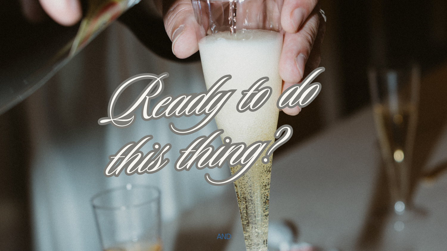 Hands pour a creamy cocktail mixture from a silver shaker into an elegant coupe glass at a bar.