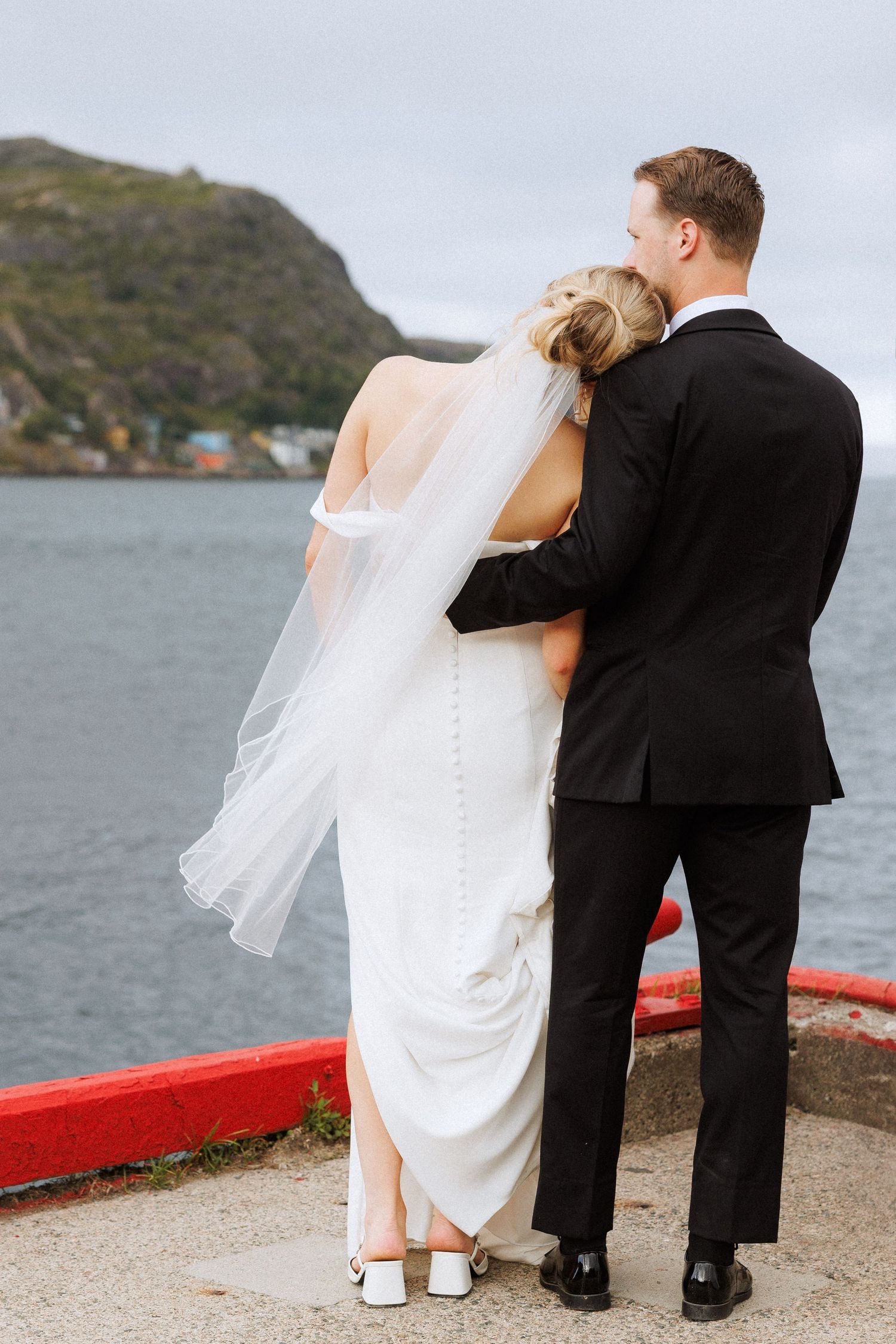 Bride and Groom in downtown St. John’s captured by Newfoundland documentary style wedding photographer Kaitlyn Yvette