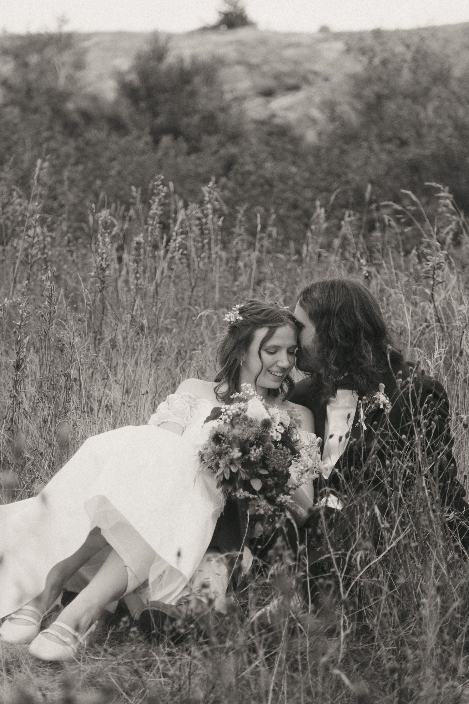 Candid wedding moment at Signal Hill, St. John's captured by Newfoundland documentary wedding photographer Kaitlyn Yvette