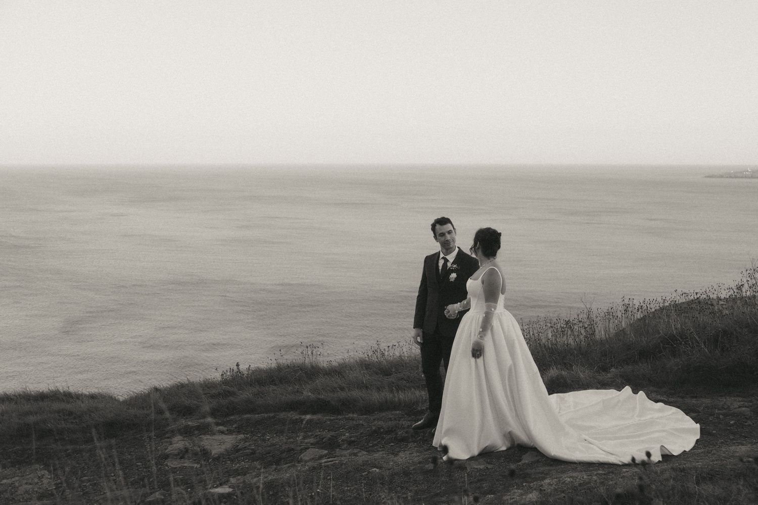 A moment alone on wedding day at Signal Hill. Captured by Newfoundland Wedding Photographer, Kaitlyn Yvette