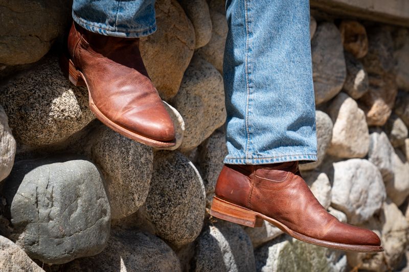 Product photography of boots by Travis Sean Studios