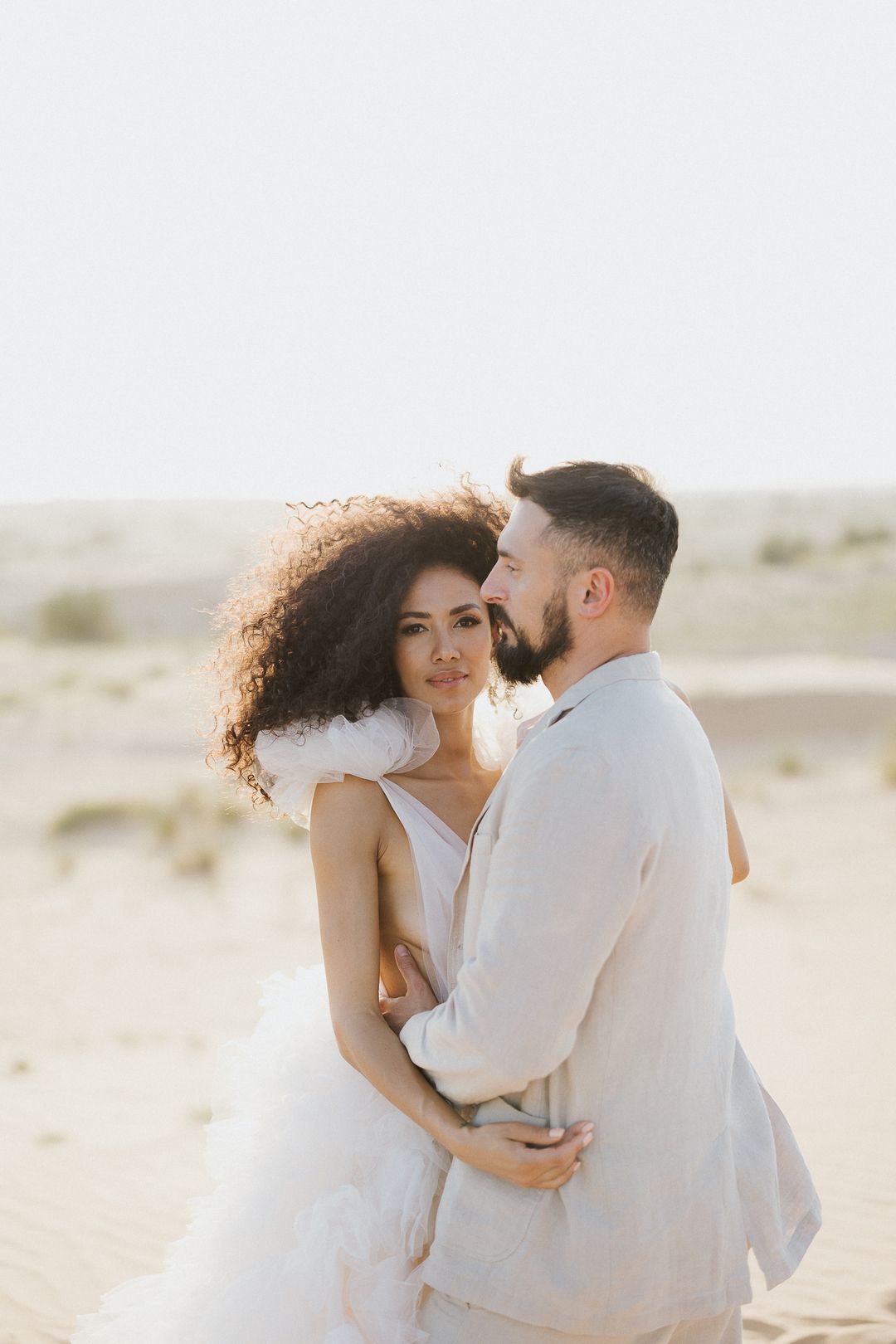 Intimate moment between a couple during a photoshoot
