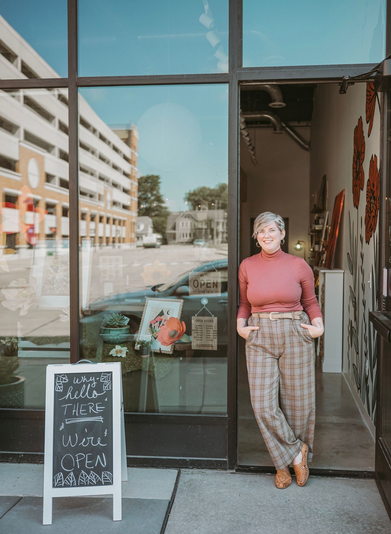 A series of connected storefront images showing a small business entrance with a chalkboard sign and plaid pants.