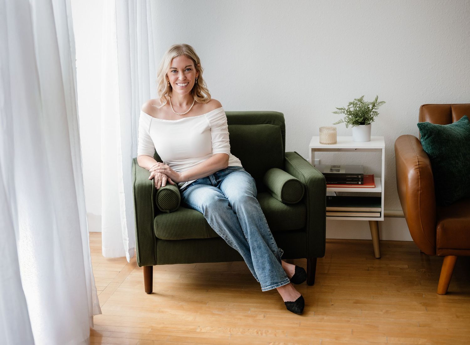 Lifestyle branding photo series in a bright living room with modern furniture and natural lighting.