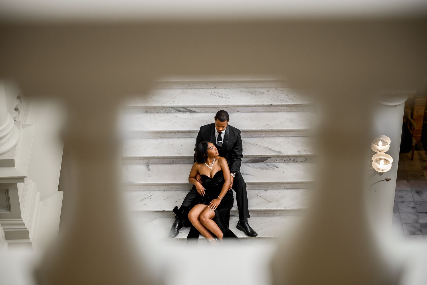 Artistic vignette series showing couple on marble steps with dramatic lighting.