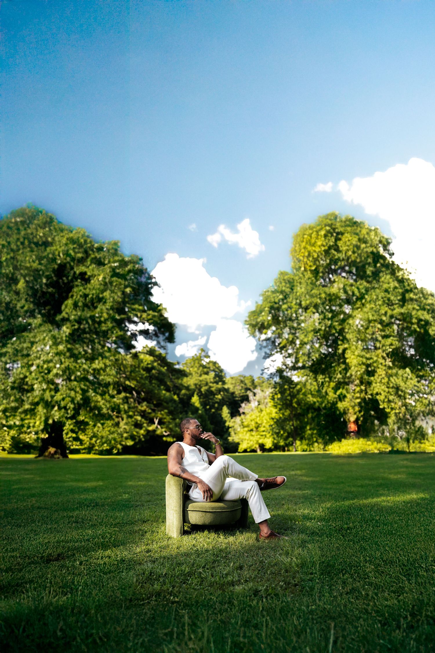 A series of photos showing someone relaxing on a grassy hill during a sunny day.