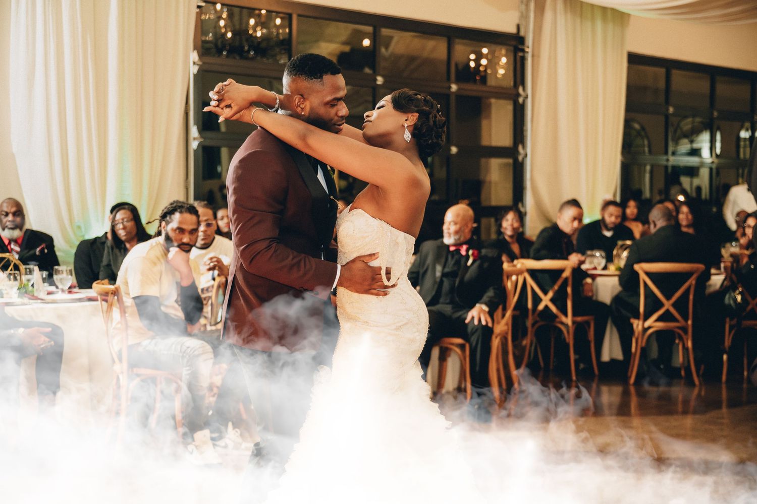 Wedding dance floor filled with fog effects and ambient lighting.