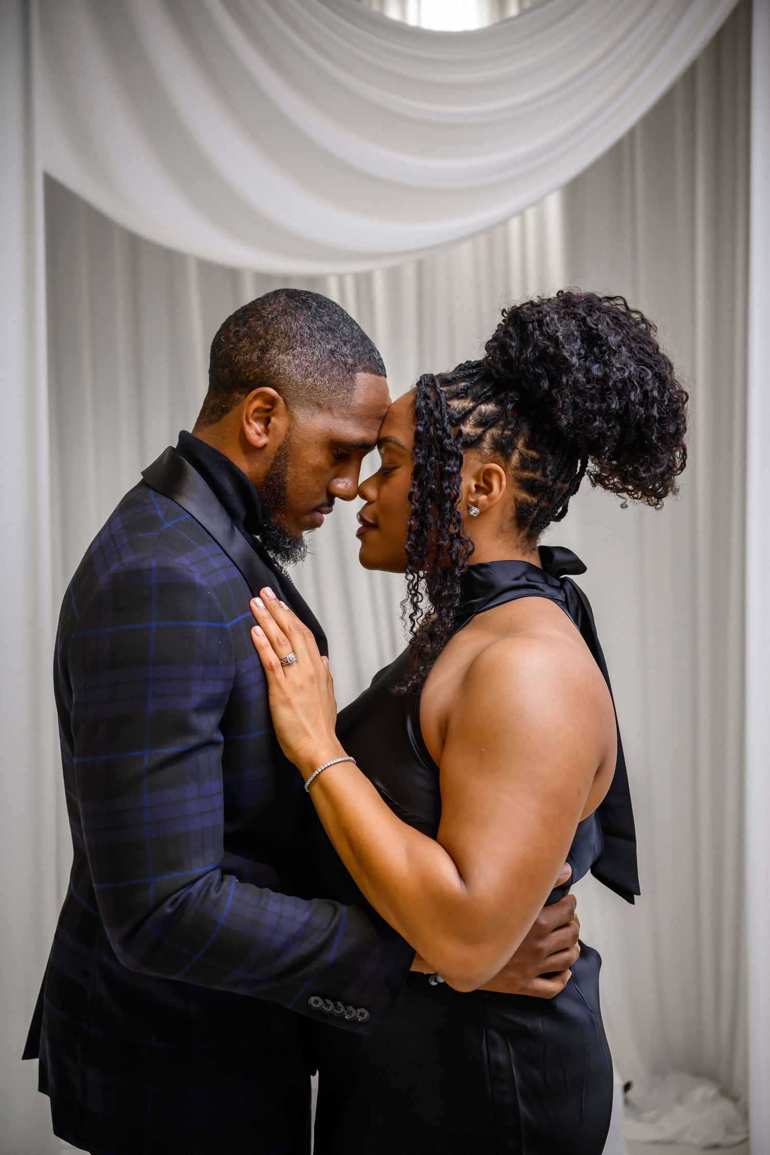 Three sequential photos show a romantic dance embrace between a couple in formal attire against white curtains.