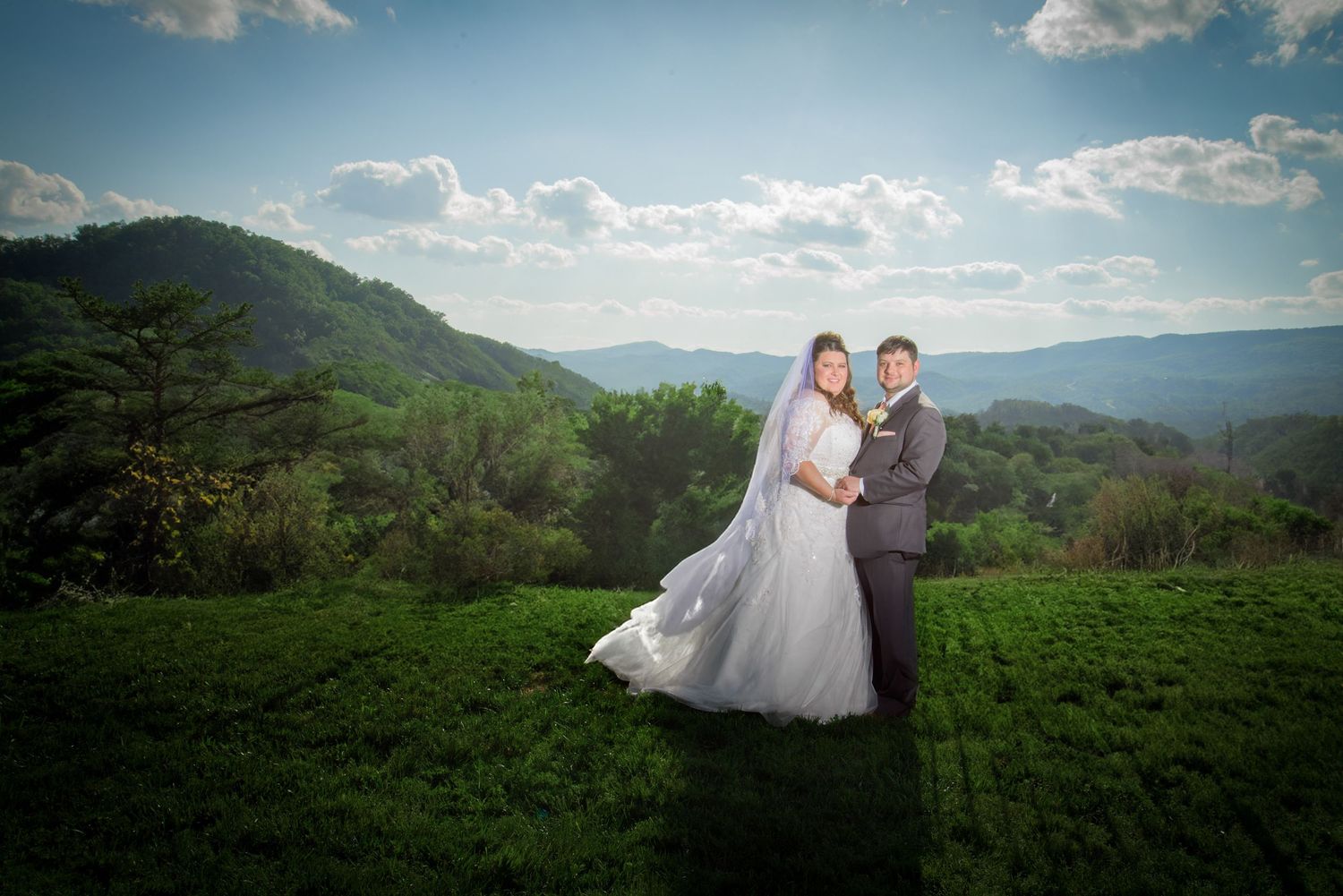 pigeon forge wedding photographers portrait of wedding couple again the blue ridge mountain backdrop in Tennessee.