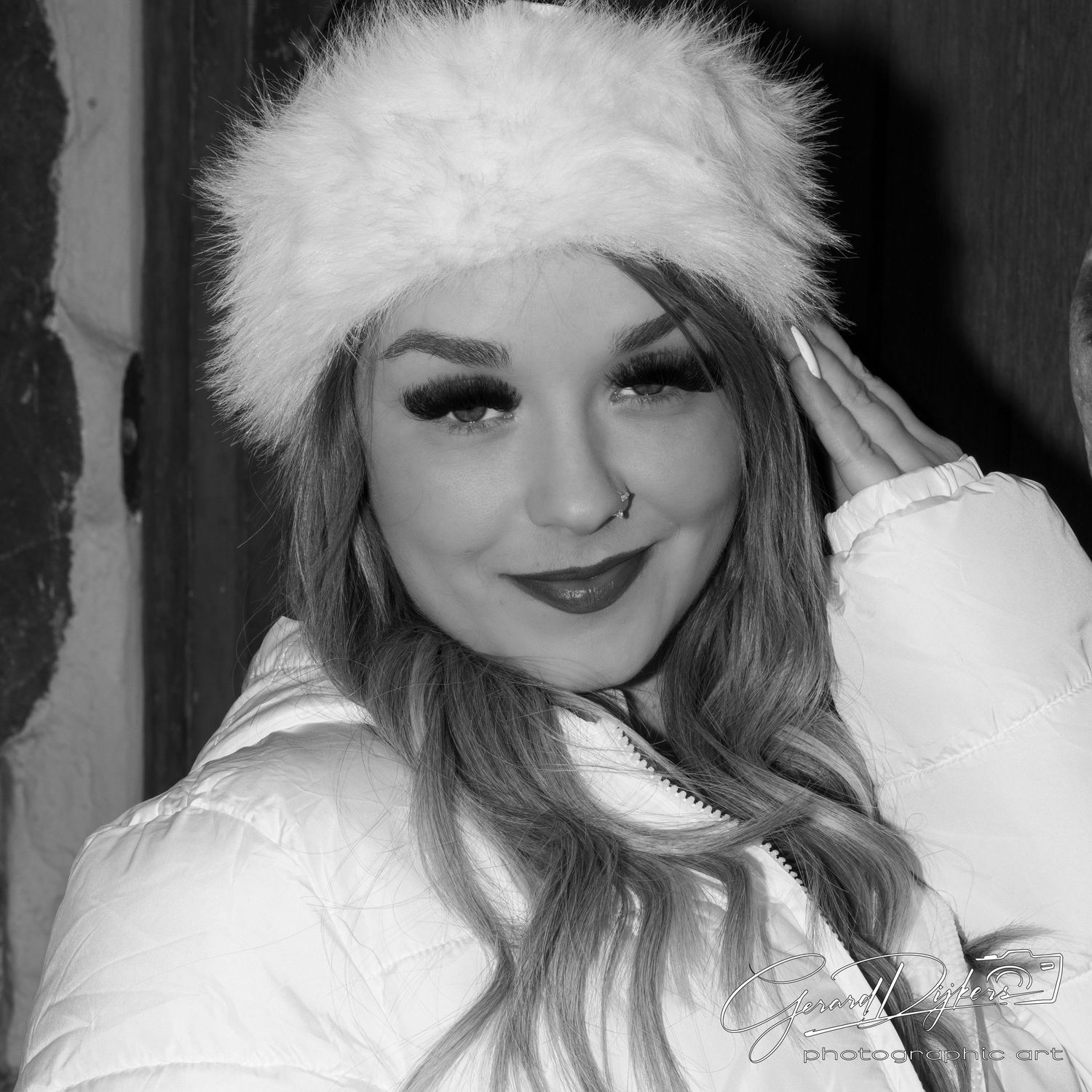 Black and white portrait collage showing someone in white fur hat with playful expressions and poses.