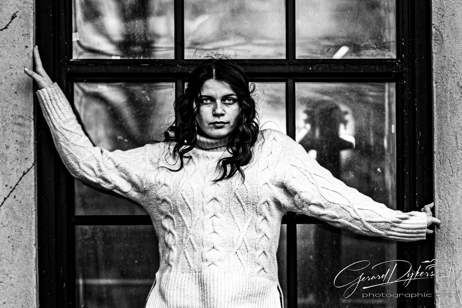 A black and white photo collage shows a person posing in different positions near windows and doorways.