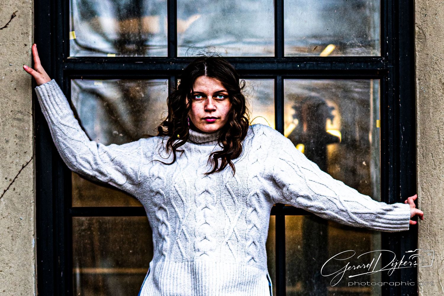 A person in a white blouse poses against a rustic stone wall with windows in multiple artistic shots.
