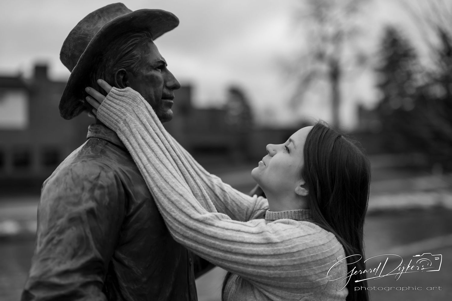 A series of black and white photographs showing intimate moments between a couple in casual winter attire.