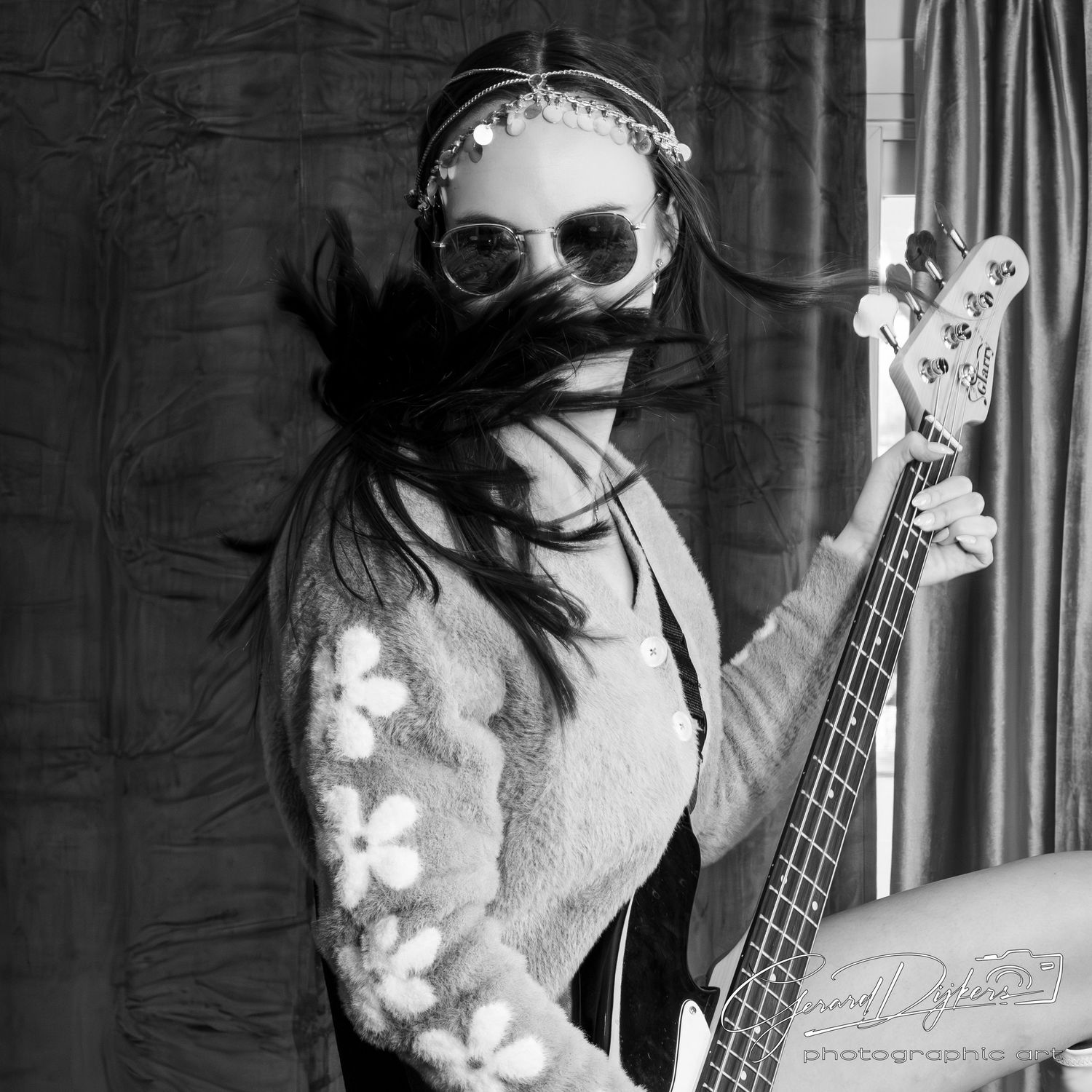A black and white photo series showing a person with sunglasses playing bass guitar against a textured background.