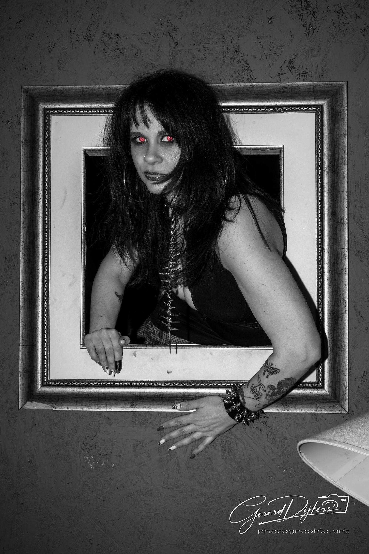 A creative black and white triptych photo series showing someone playfully peeking through decorative picture frames.