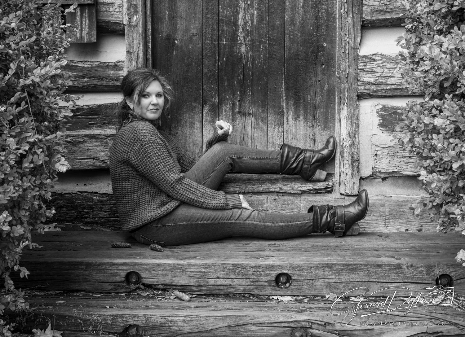 A black and white photo sequence shows someone lying down and rolling playfully across a rustic wooden porch.