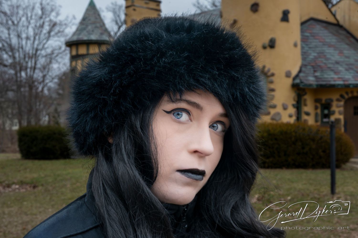 A gothic-themed photo series shows a person in black winter attire against a yellow castle-like building in moody lighting.