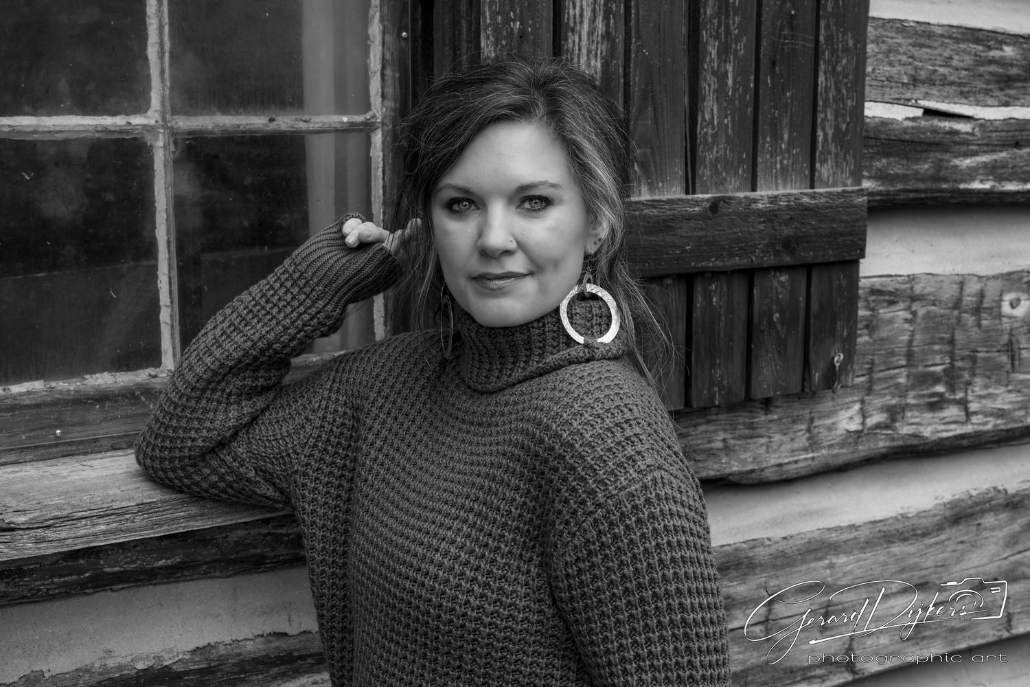 Black and white portrait series showing a woman in a knit sweater posing against a rustic outdoor setting.
