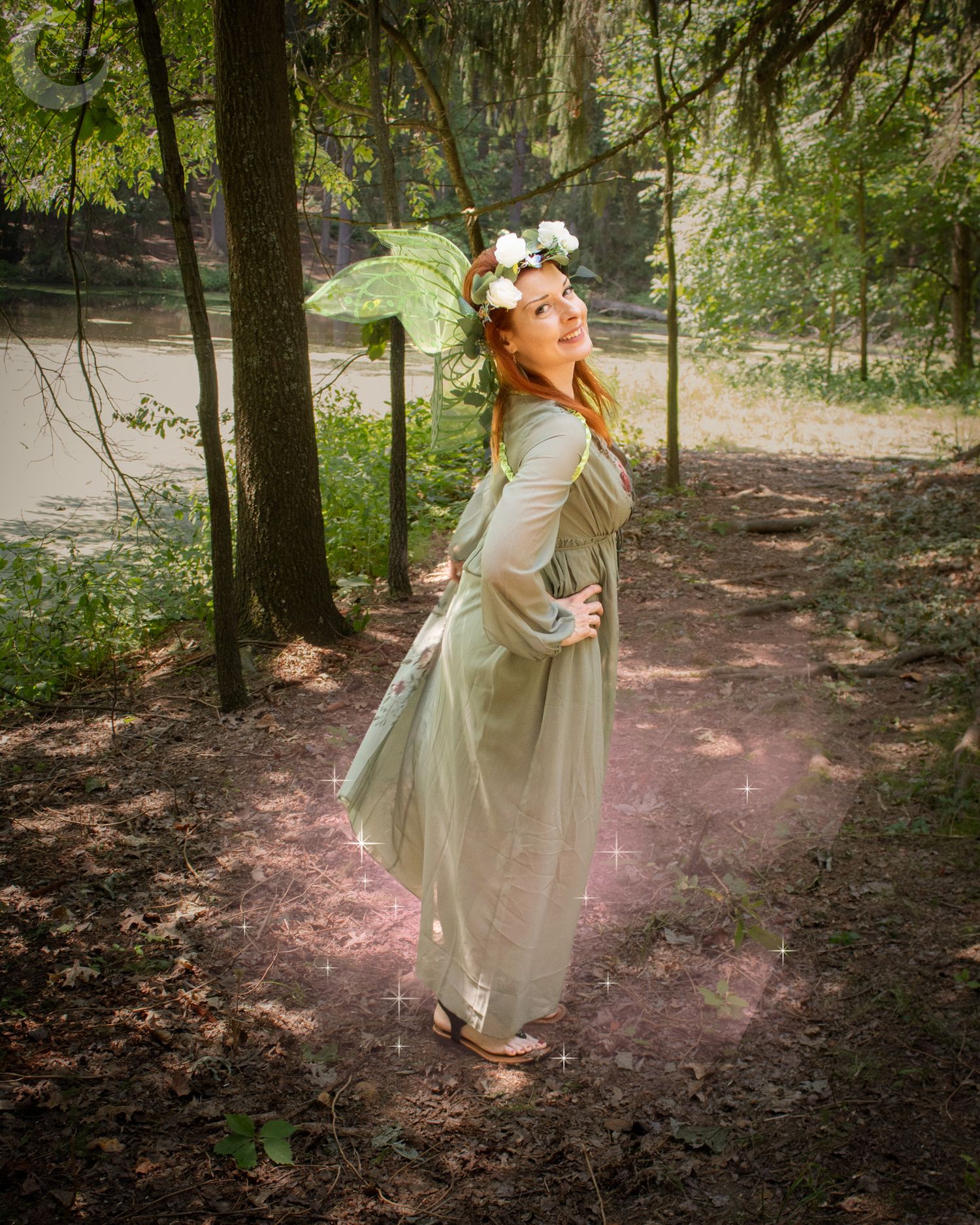 A whimsical dance sequence captured in a sunlit forest path featuring a flowing dress and ethereal movement.
