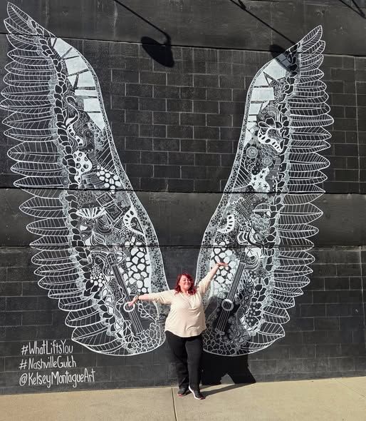 A sequence of photos showing a person posing with large decorative angel wings painted on a dark brick wall.