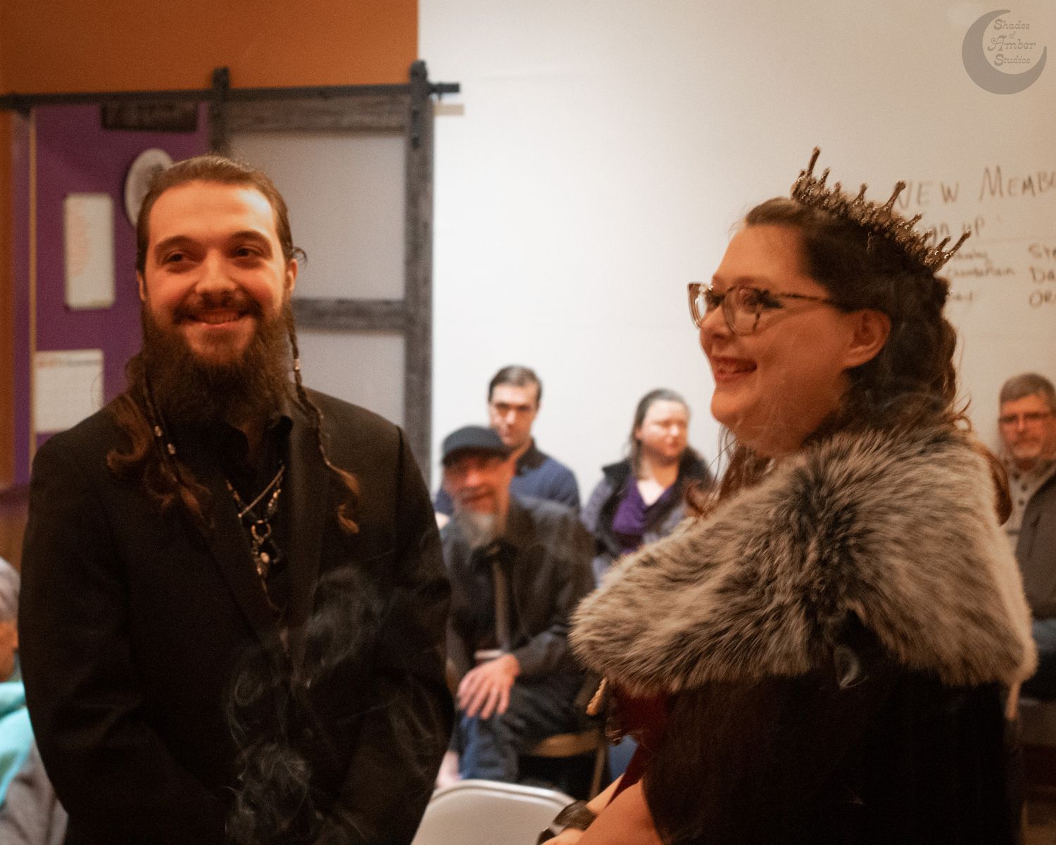 A joyful moment during an alternative ceremony with participants wearing gothic-inspired attire.