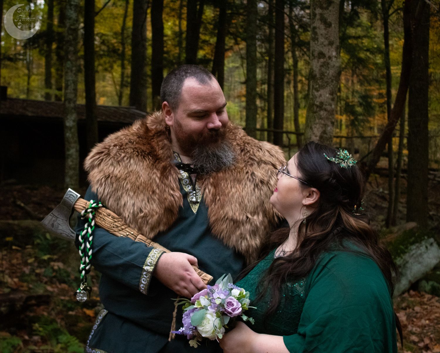 A couple in forest wedding attire share intimate moments in a sequence of romantic photos among tall trees.