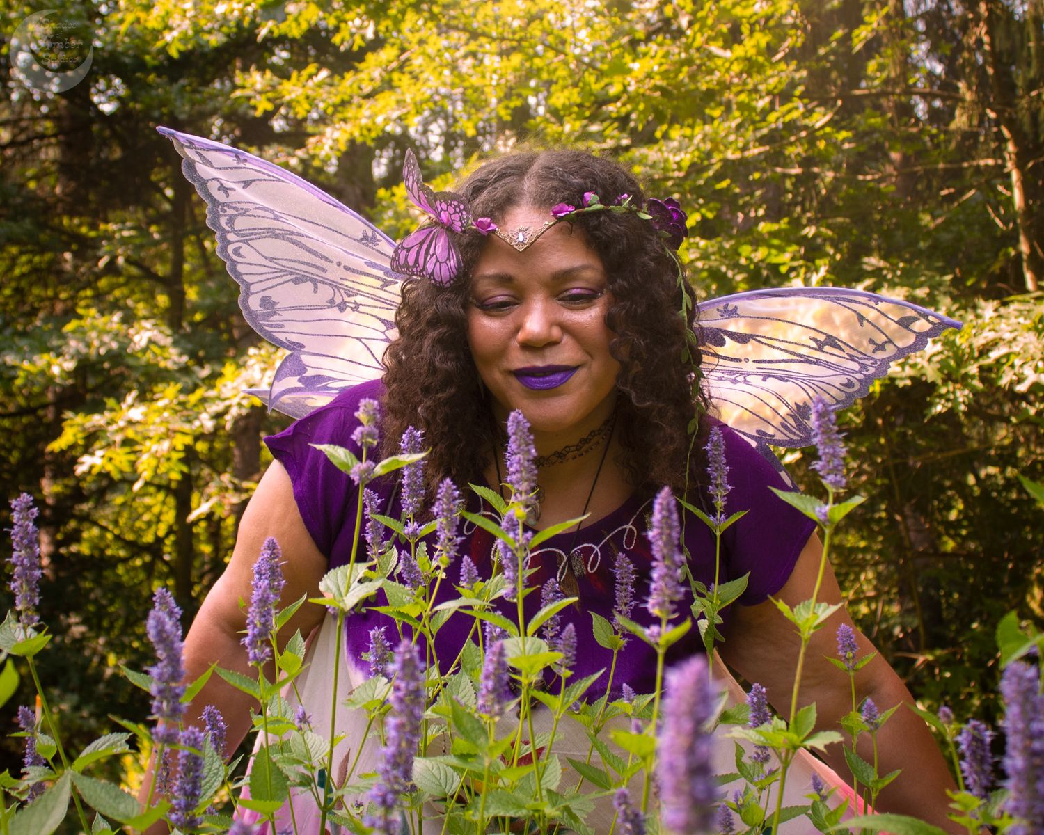 Whimsical garden scene with purple flowers and fairy-like styling.
