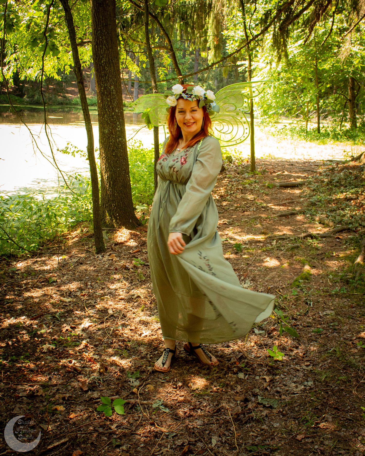 Graceful movements captured in a serene woodland setting with dappled sunlight.