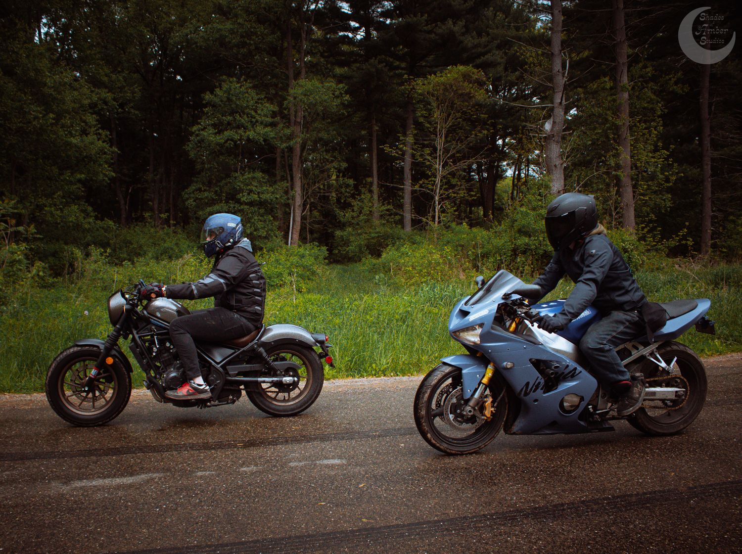 A series of motorcycle photos arranged in a panoramic sequence showing a bike parked in a forest at different angles.