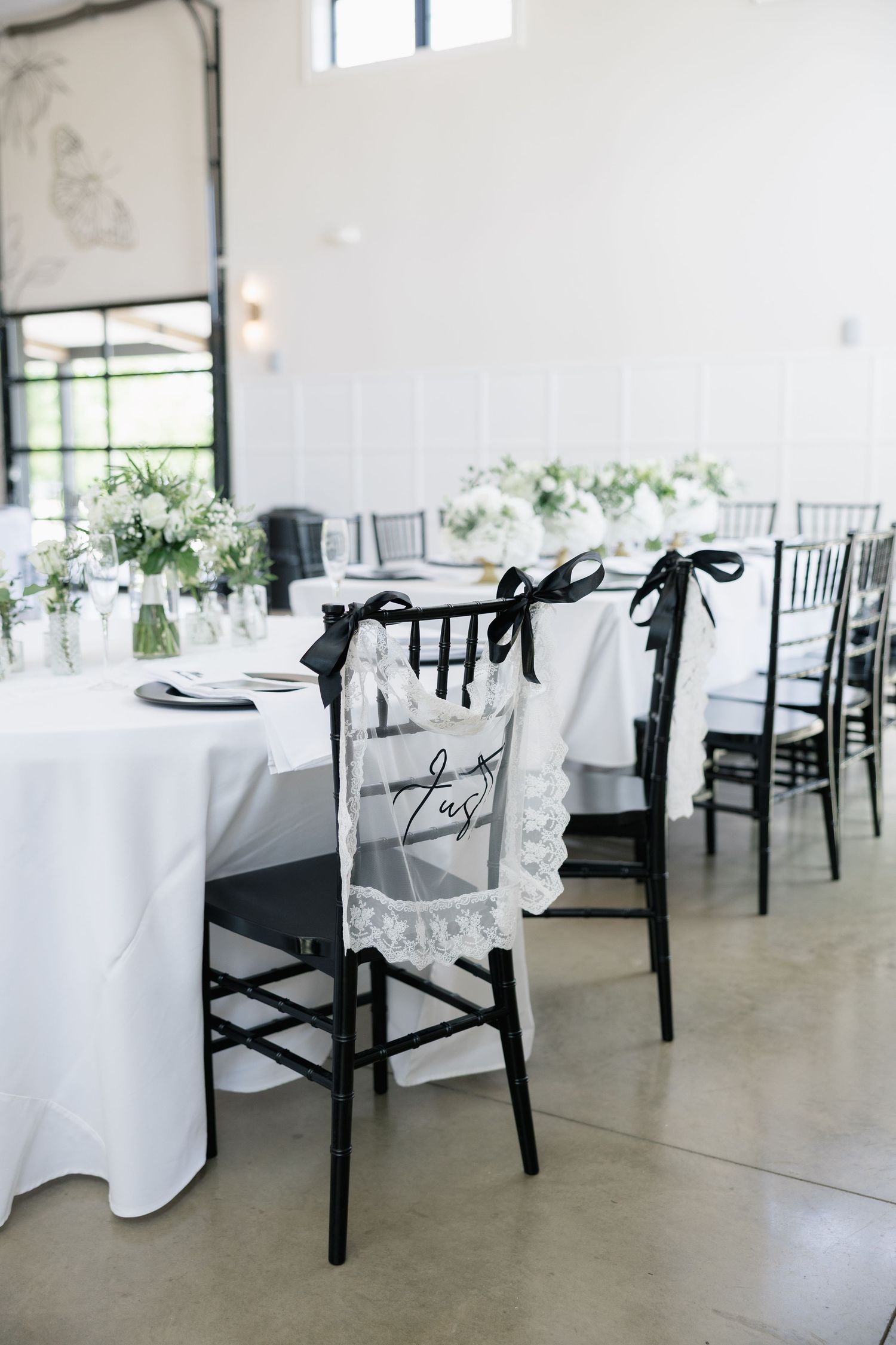 Black chiavari chairs with lace and ribbon 