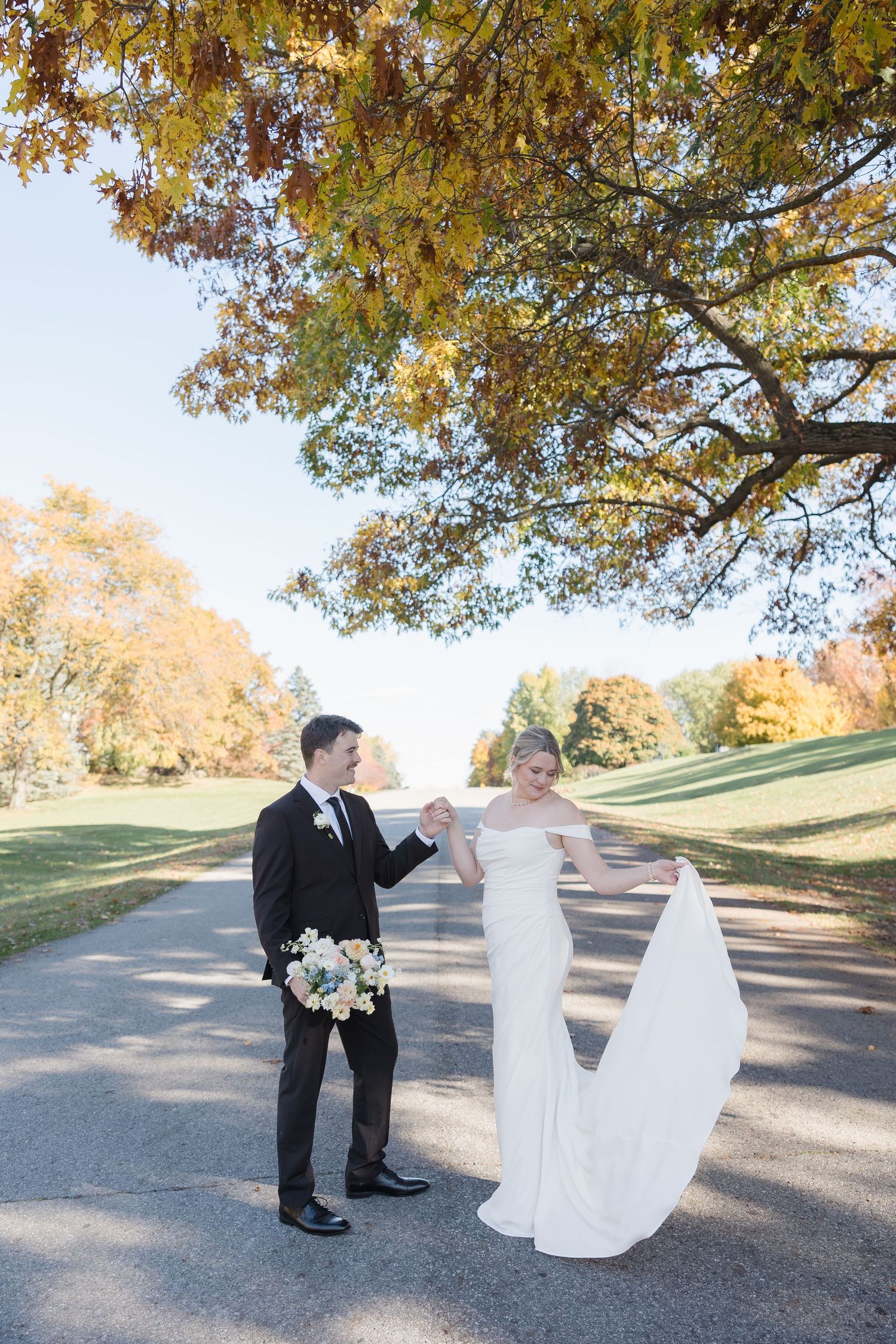 A romantic autumn wedding scene captured in a series of photos showing a couple on a tree-lined path in golden light.