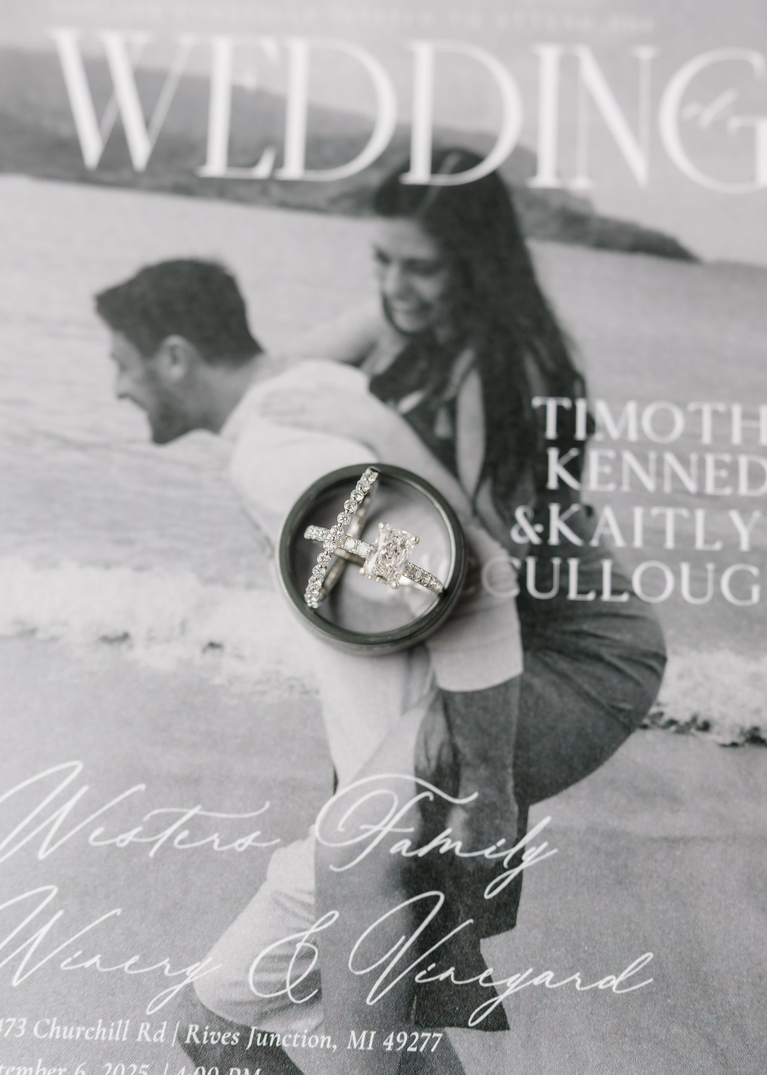 Wedding invitation featuring an engagement ring and casual beach photo.