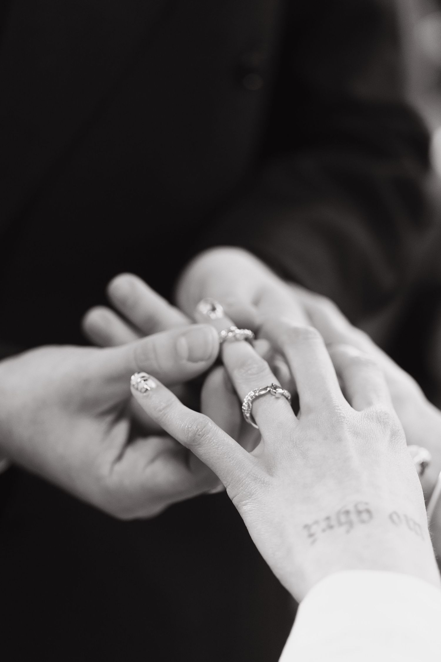 Putting ring on brides finger