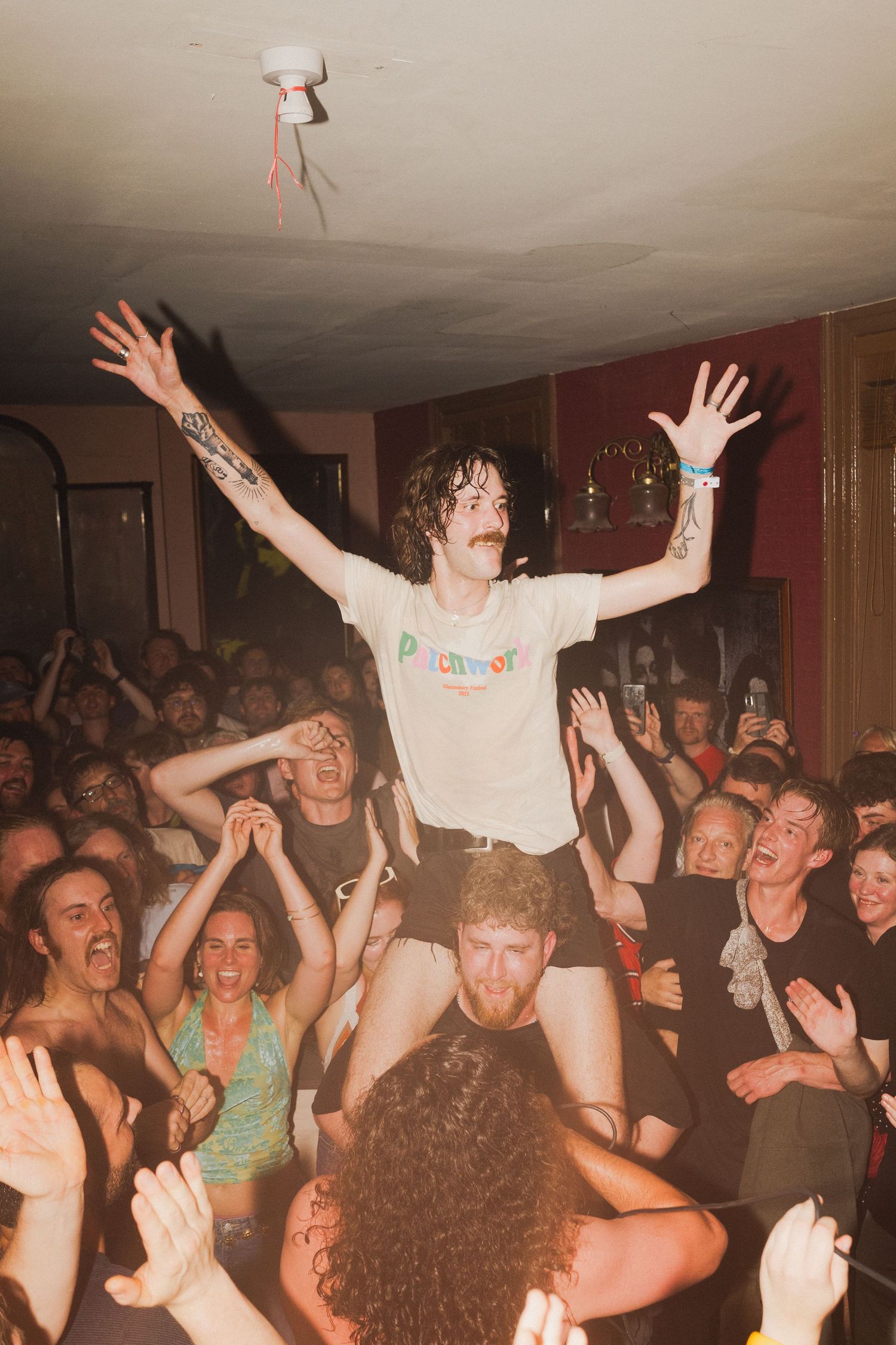 Musician crowd surfing