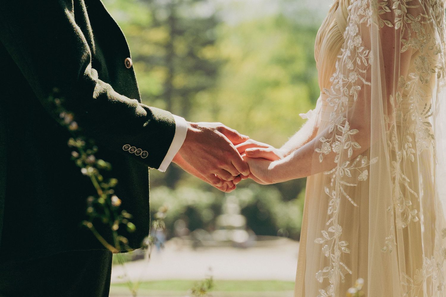 couple hold hands