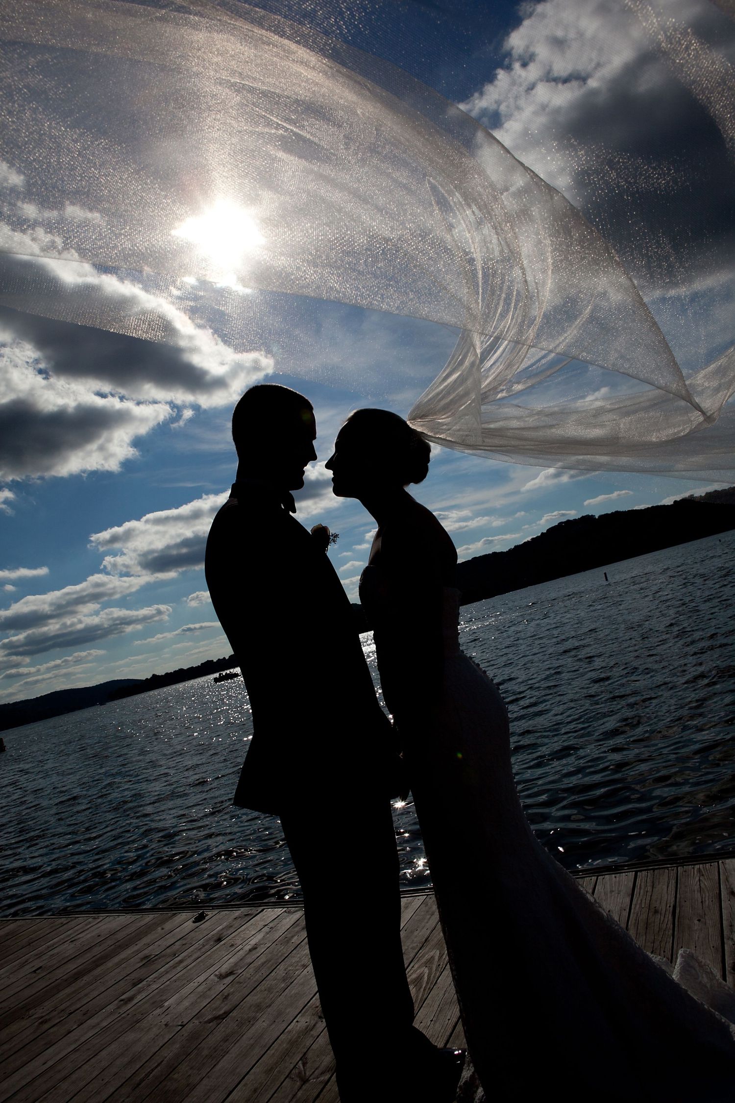 Dramatic wedding photography of bride and groom