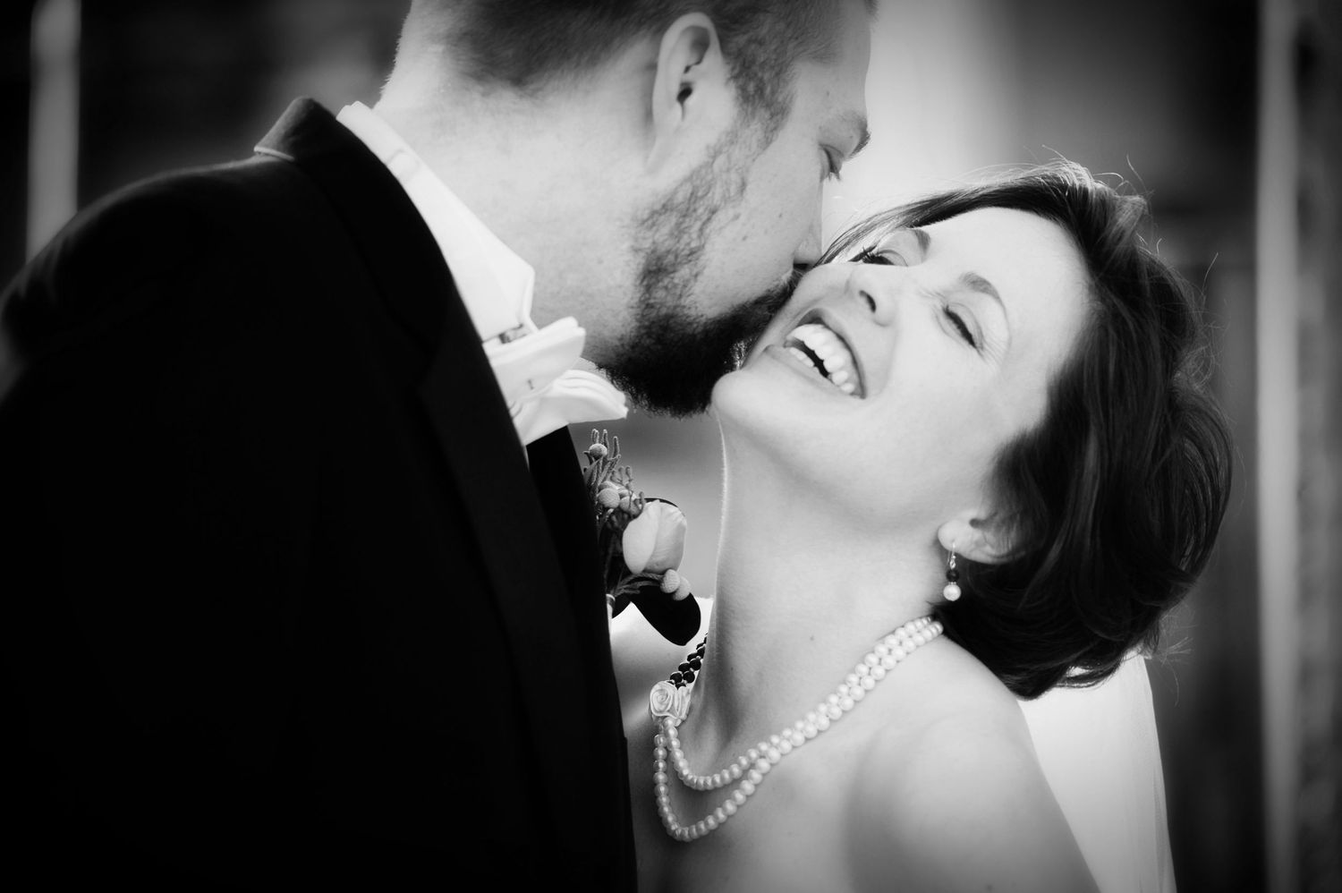 Couple laughing during engagement session in Pennsylvania