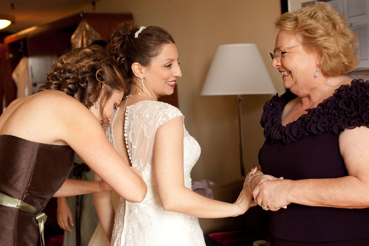 Real moment with bride and her mom photographed on her wedding day