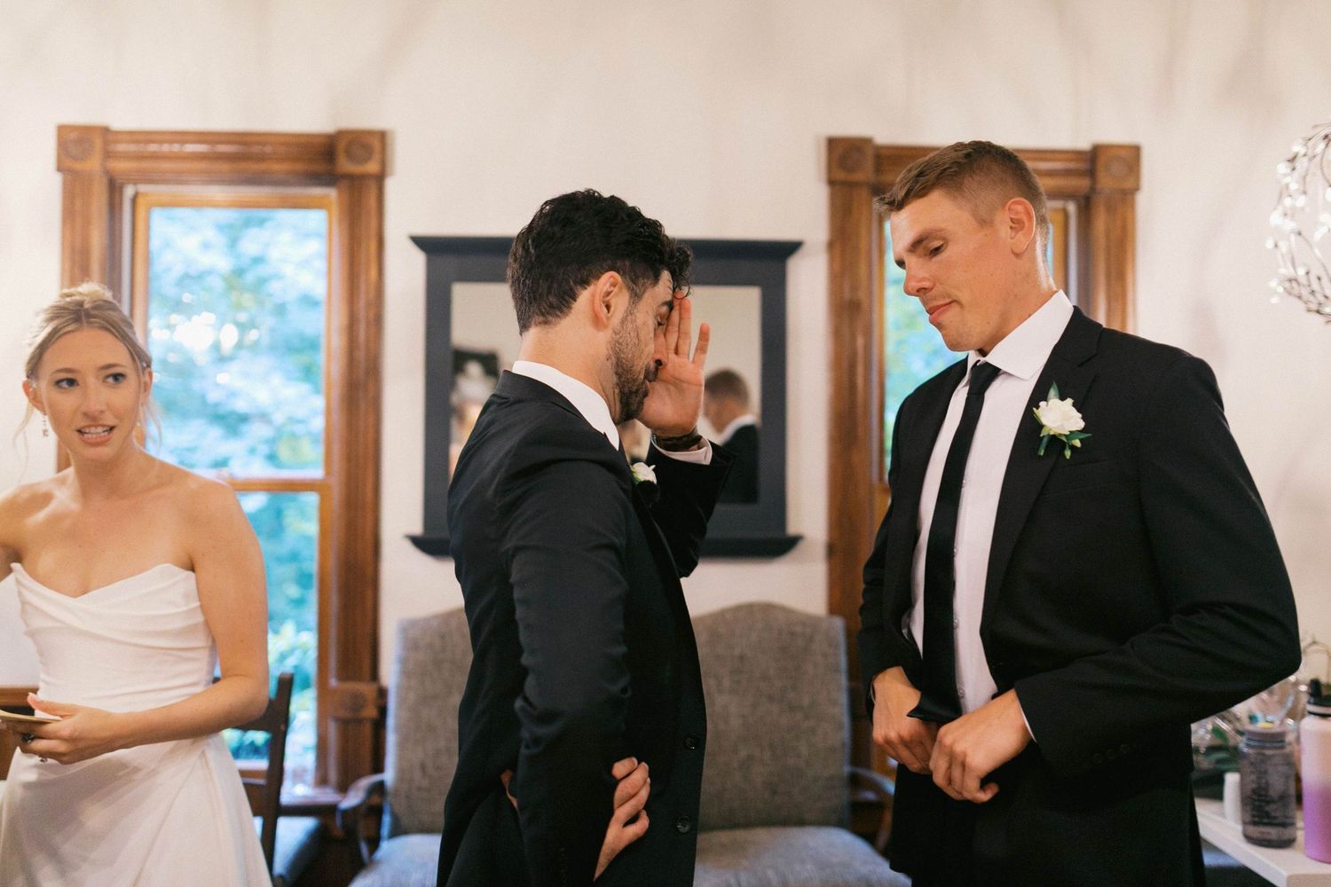 A collection of formal wedding moments showing couples and wedding party members in black and white attire.