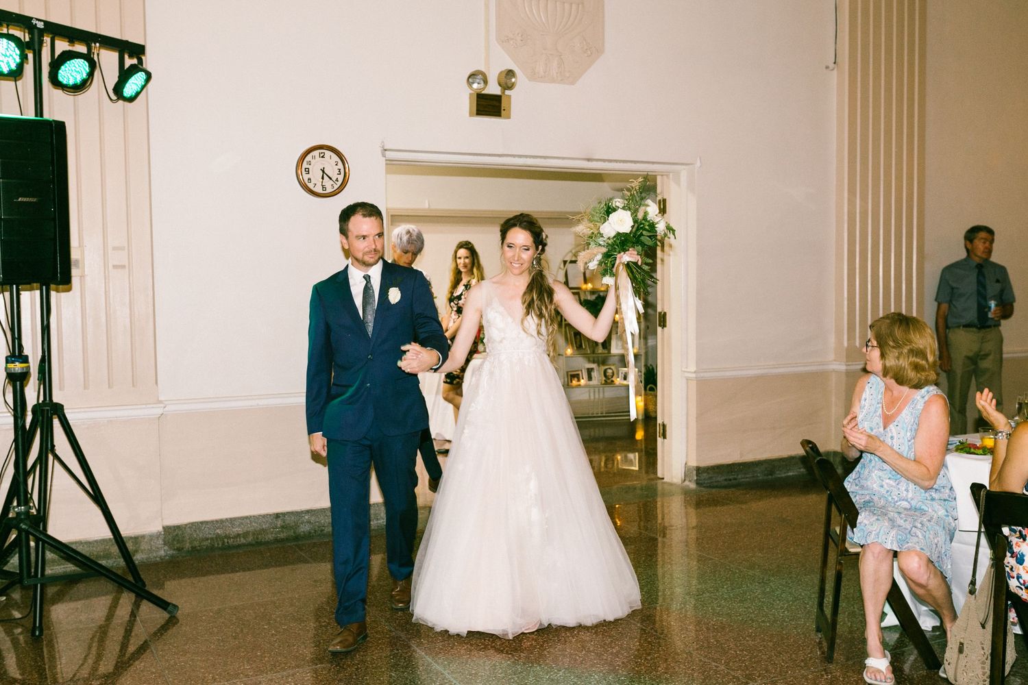 A panoramic view of multiple wedding moments captured in a vintage-style collage of photographs.