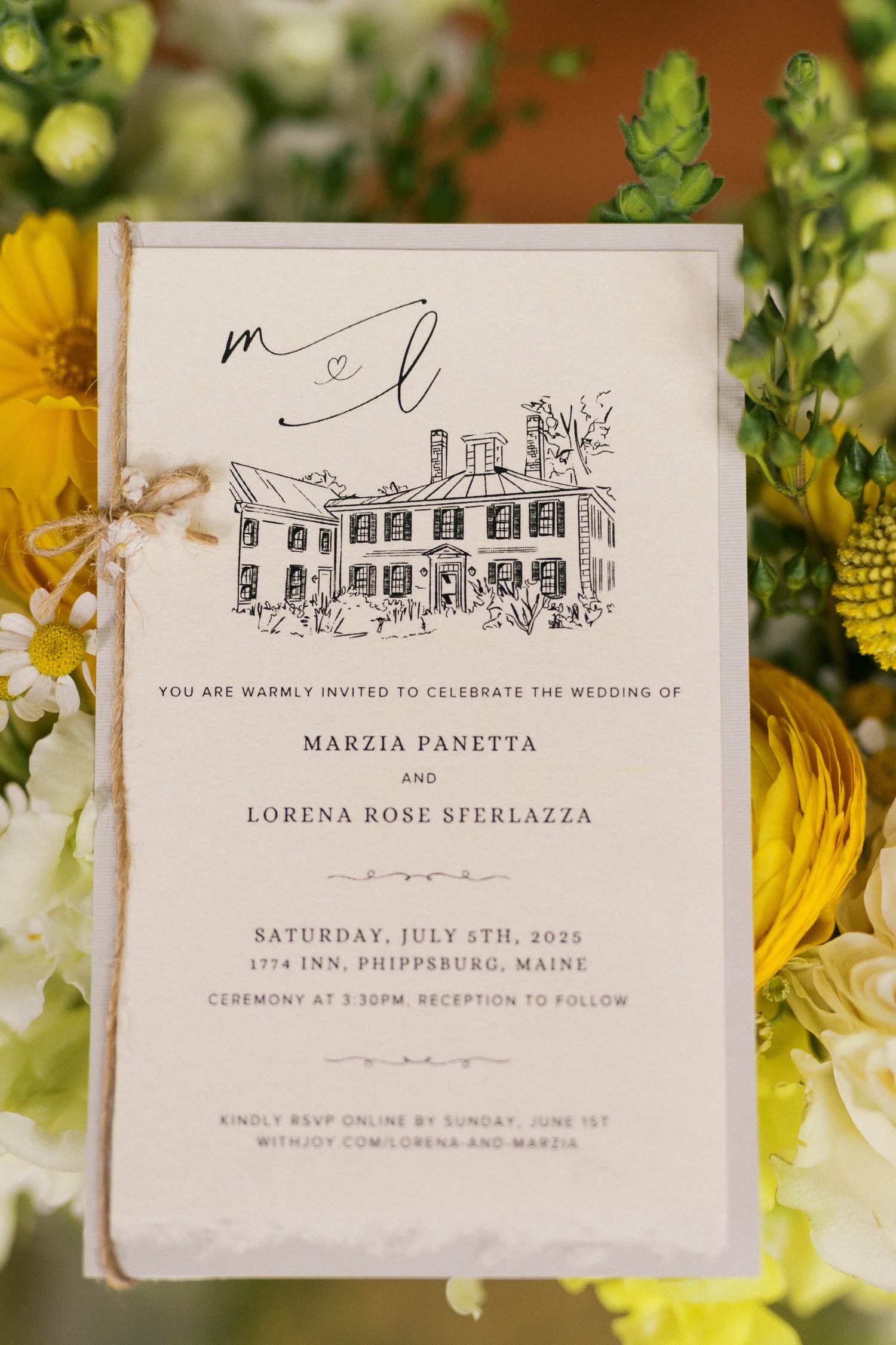 Elegant wedding invitation surrounded by yellow flowers.