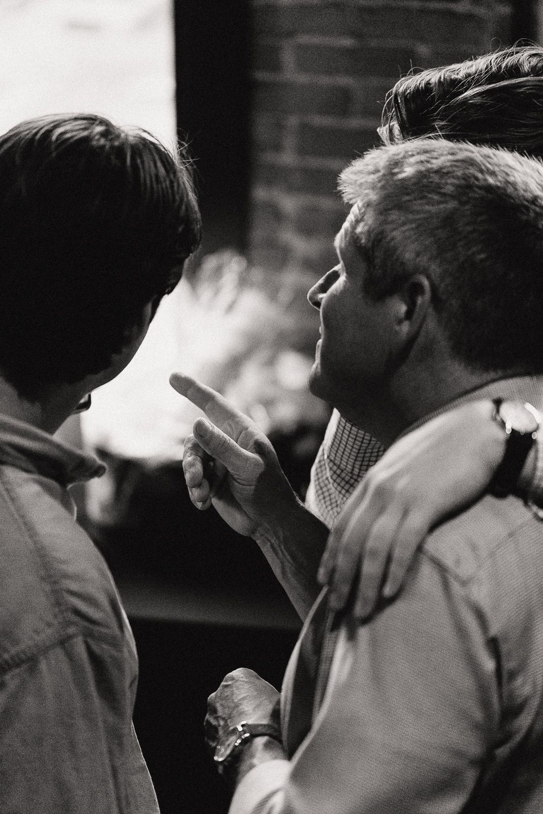 Black and white intimate portrait showing tender emotional connection.