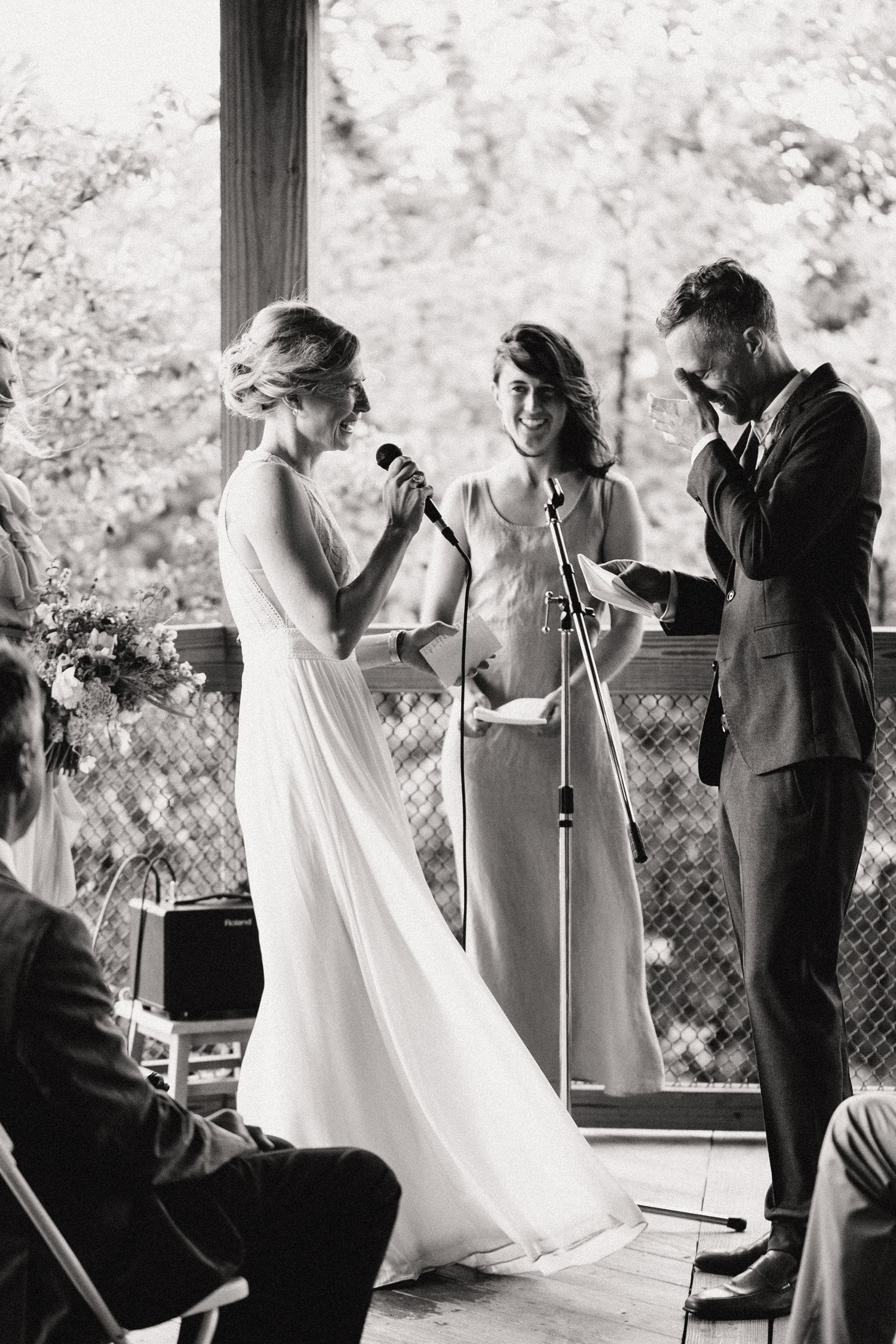 emotional groom at intimate Michigan beach wedding