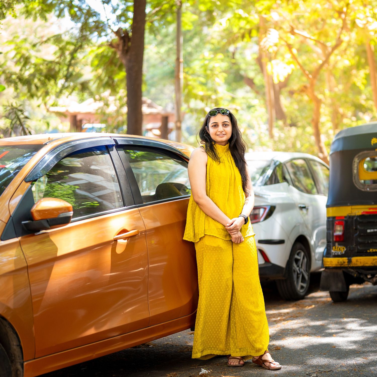 Girl leaning on a car in Mumbai