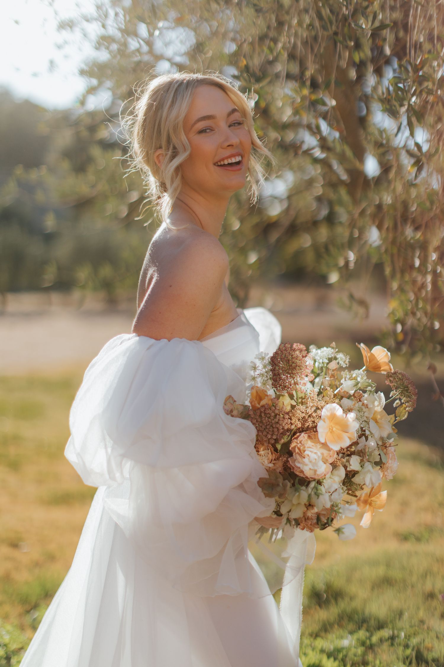 california bride holding bouquet