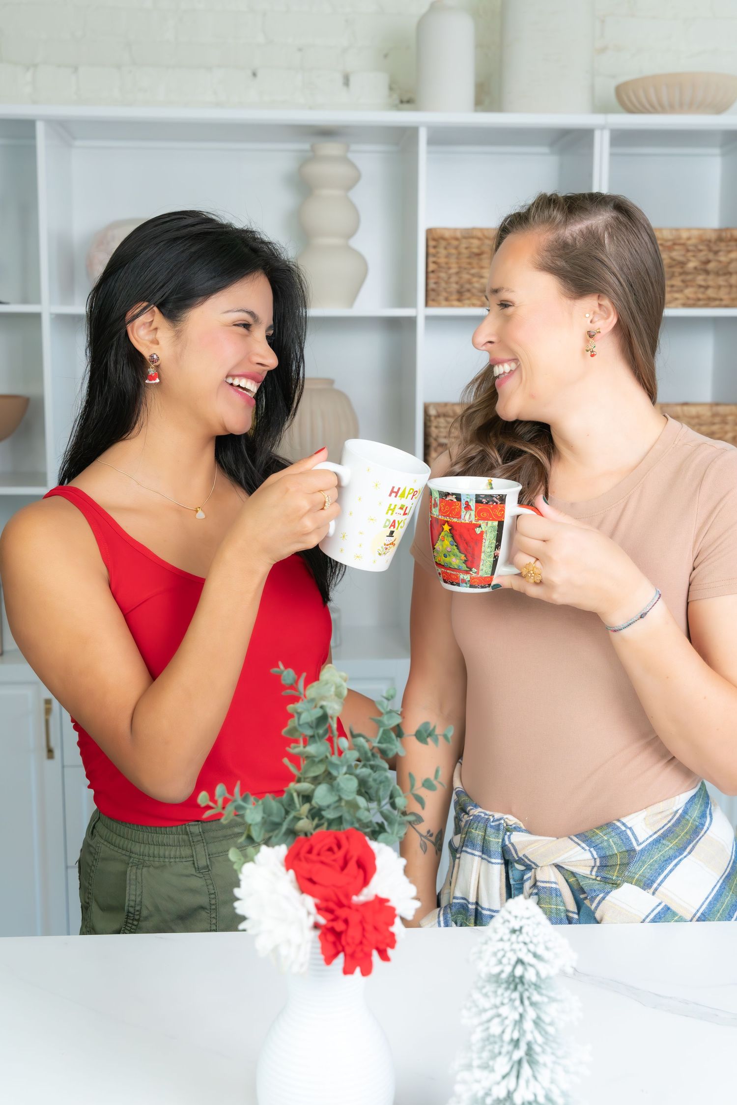 Branding portrait of two women holding coffee cups